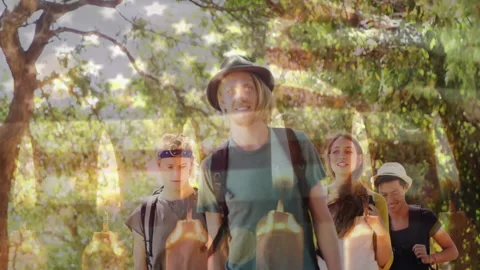Four hikers stepping onto trail for tourism activating growing flag overlay and Stock Footage 310863908