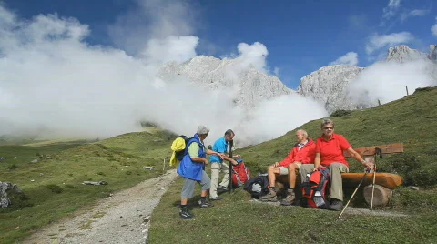 Four hikers taking a rest Stock Footage 525158