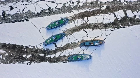 Four icebreakers on Vistula river crushes ice, 2020-02-18, Plock, Poland Stock Footage 148937404