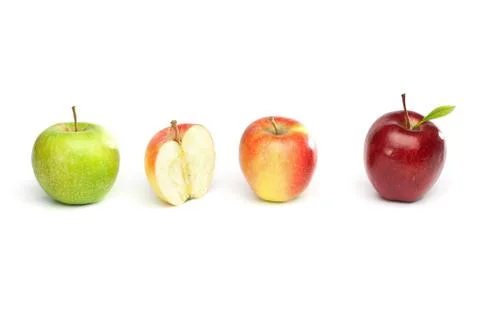 Four isolated apples in a row Stock Photos