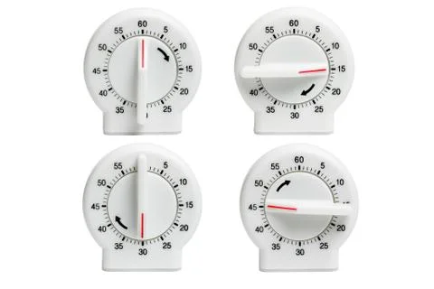 Four kitchen timers Stock Photos