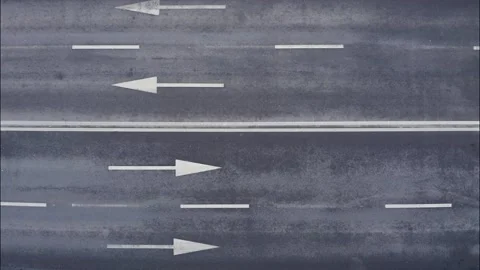 Four lane road marked with arrows. Paved and marked highway. Stock Footage 150598345