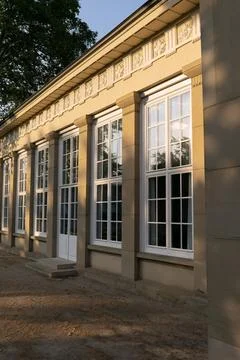 Four large old windows in an old building. Stock Photos