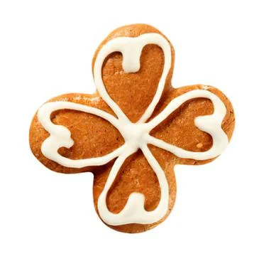Four-leaf clover cookie with white icing Fotos de archivo