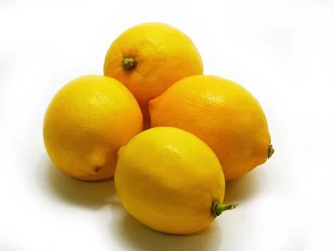Four lemons on white background Stock Photos