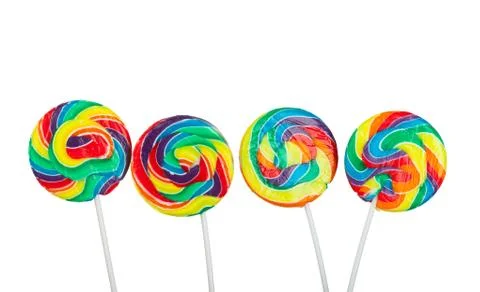 Four lollipops Stock Photos