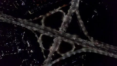 Four-Loop Highway Interchange At Dark, Drone Top-Down View Stock Footage 345268570
