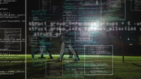 Four males walking across lit grass field, motion causing tech code windows Stock Footage 333463295