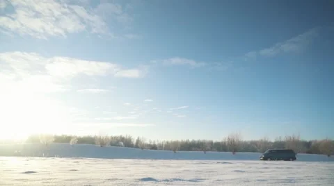 Four men push broken van in a sunny winter day Video stock 61286519