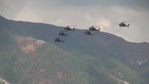 Four Mi-28N combat helicopter night hunter (Havoc) perform group aerobatics Stock Footage 135263121