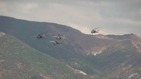 Four Mi-28N combat helicopter night hunter (Havoc) perform group aerobatics Stock Footage 135263231