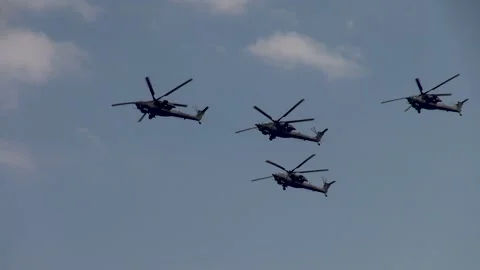 Four Mi-28N combat helicopter night hunter (Havoc) perform group aerobatics Stock Footage 135319046