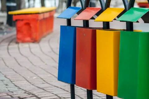 Four multi-colored garbage bins a perspective view 写真素材