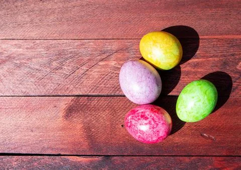 Four multicolored bright easter eggs Stock Photos