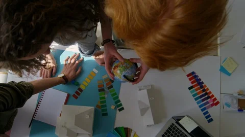 Four Multiracial Designers Choosing Colour Samples Stock Footage 106602489