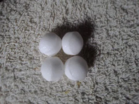 Four Nephthalene Balls Stock Photos