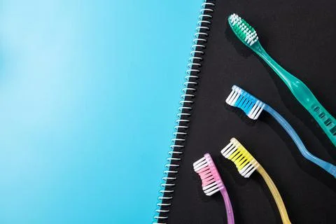 Four new toothbrushes Stock Photos