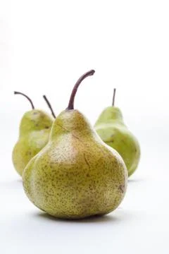Four pears isolated on white Stock Photos