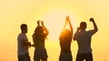 The four people dancing on the background of the sunset. slow motion 4k or 4k+ Resolution
