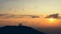 The four people dancing on a mountain against the picturesque sunset 4k or 4k+ Resolution