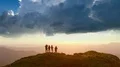 The four people dancing on the mountain with the beautiful view 4k or 4k+ Resolution
