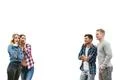 The four people flirt on the white wall background Photo