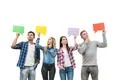 The four people hold dialog signs on the white background Photo