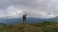 The four people jumping on the mountain with a picturesque landscape 4k or 4k+ Resolution