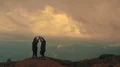 The four people jumping on a mountain top 4k or 4k+ Resolution