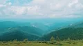 The four people standing on a beautiful mountain 4k or 4k+ Resolution