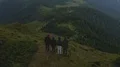 The four people standing on the mountain with a beautiful landscape 4k or 4k+ Resolution