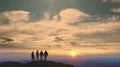 The four people standing on a mountain on a beautiful sunrise background 4k or 4k+ Resolution