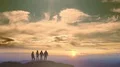 The four people standing on a mountain on a beautiful sunrise background 4k or 4k+ Resolution