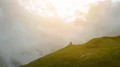 The four people standing on a mountain with a picturesque cloud view 4k or 4k+ Resolution
