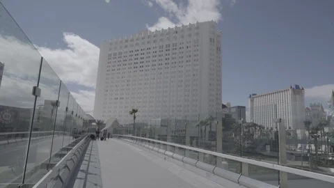 Four people Walk on Empty Las Vegas Overpass Stock Footage 126563771