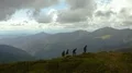 The four people walking on the beautiful mountain 4k or 4k+ Resolution