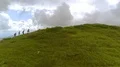 The four people walking up the mountain 4k or 4k+ Resolution