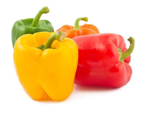 Four peppers on white background Stock Photos
