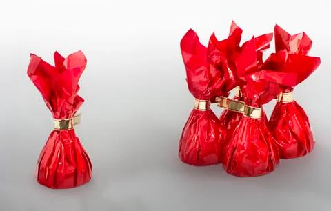 Four plus one red candies Stock Photos