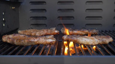 Four pork chops on bbq grill, front angle Video stock 90298744