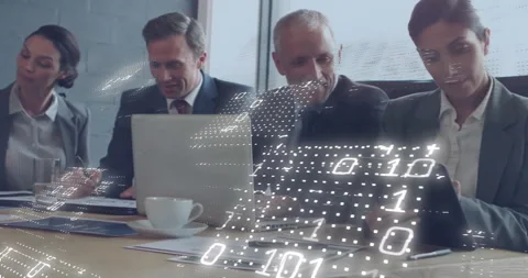 Four professionals using laptops at meeting table, with floating binary code Stock Footage 309067248