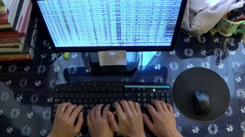 Four programmer hands typing the keyboard,and the data running on the screen Stock Footage 42798682