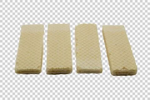 Four rectangular vanilla wafer cookies with a textured grid pattern Stock Photos