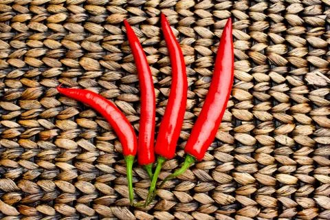 Four Red Chilli Peppers Stock Photos