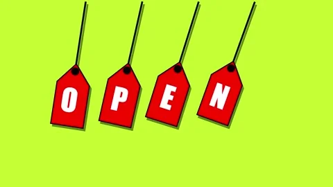 Four red tags with the word open animated on a bright green background. Video stock 260161424