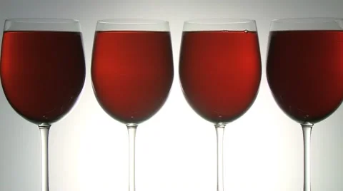 FOUR RED WINE GLASSES 動画素材 58959276