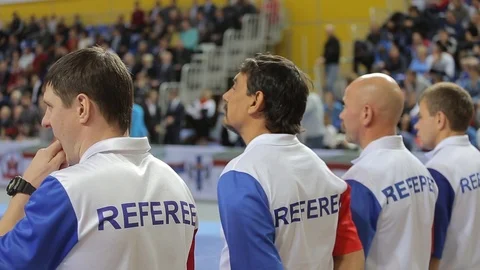Four referees prepare for competitions Stock Footage 87027704