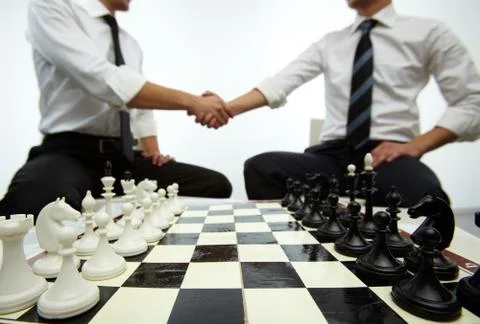 Chess board with figures in white background, Stock image