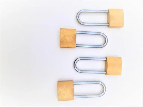 Four rusty padlock on a white background 스톡 사진