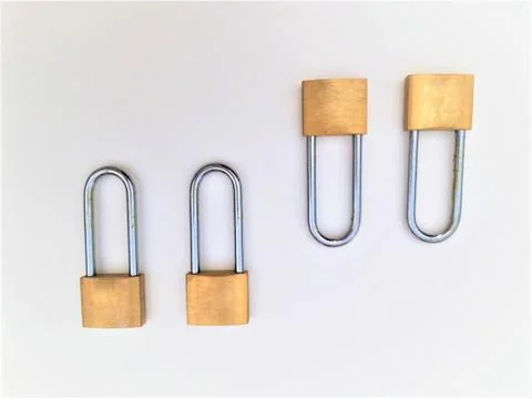 Four rusty padlock on a white background Stock Photos